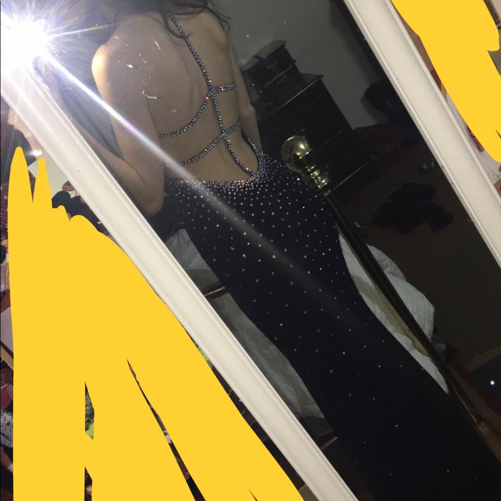 Gorgeous slim fitting, backless gown.